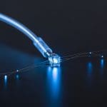 Silicon T Center Achieves Long-Distance Quantum Communication with Enhanced Fidelity