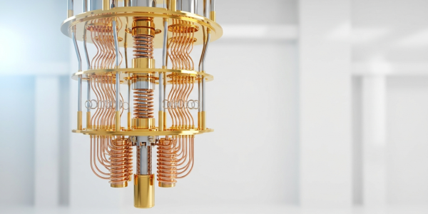 A gold quantum computer chandelier in a bright lab