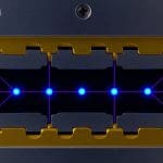 Trapped ion quantum computer using laser-controlled individual atoms
