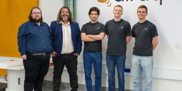 Logical advantage of Pinnacle confirmed on spin-qubit hardware