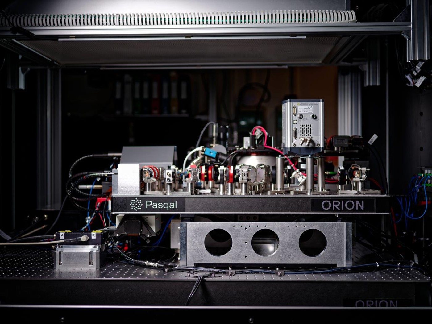 Pasqal (Psql), The Complete Commercial History Since 2019 Pasqal Orion optical bench, the laser assembly inside a neutral-atom quantum processor