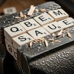 Compression Advances Intelligence in Large Language Models and Multimedia Systems